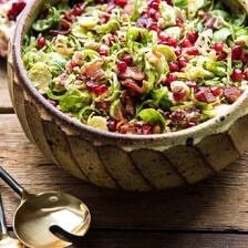 Shredded Brussels Sprout Bacon Salad with Warm Cider Vinaigrette | halfbakedharvest.com #brusselssprouts #salad #thanksgiving #fall #winter #healthy