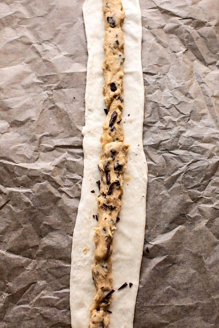 Chocolate Chip Cookie dough on soft pretzel before baking