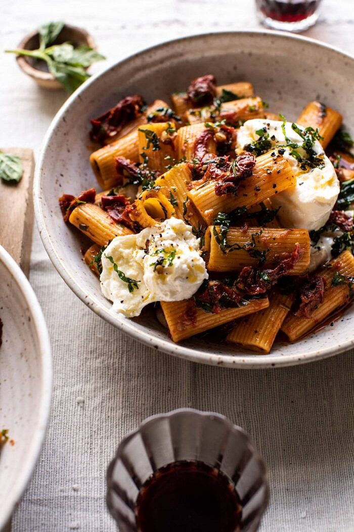 side angled close up photo of Quick Pantry Pasta with Sun-Dried Tomatoes and Burrata 