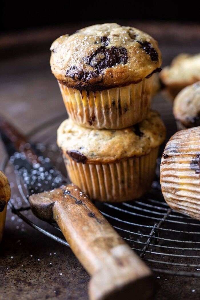 side angled close up photo of Cheesecake Stuffed Chocolate Chunk Banana Bread Muffins 