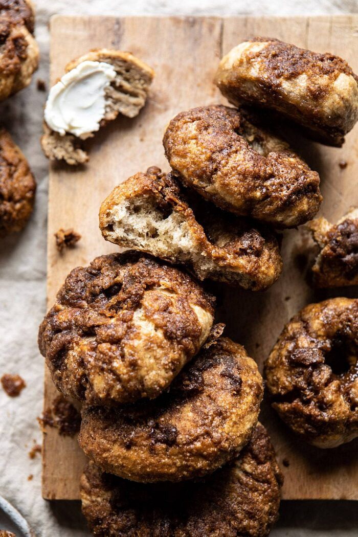 Homemade Cinnamon Crunch Bagels with bite taken out of bagel