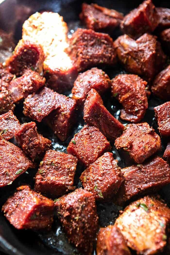 Cajun Butter Steakin skillet cooking