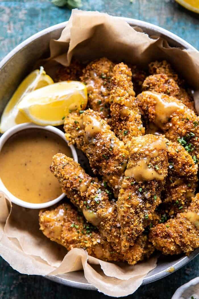 overhead close up photo of Baked Black Pepper Ranch Chicken Fingers with Honey Mustard