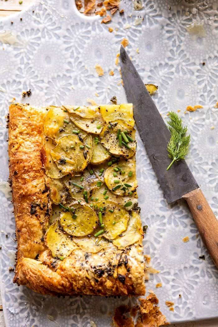 overhead photo of Cheesy Potato Chive Galette slice