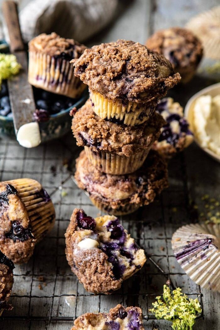 Blueberry Swirl Coffee Cake Muffins stacked on top of each other