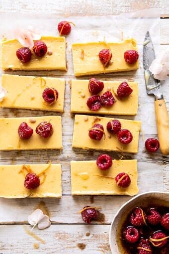Creamy Lemon Bars with Browned Butter Raspberries | halfbakedharvest.com #lemon #brownbutter #spring #summer #easter #mothersday #brunch #dessert