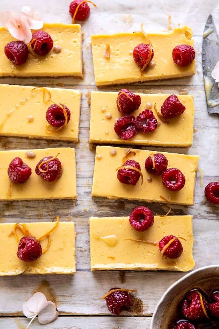 Creamy Lemon Bars with Browned Butter Raspberries | halfbakedharvest.com #lemon #brownbutter #spring #summer #easter #mothersday #brunch #dessert