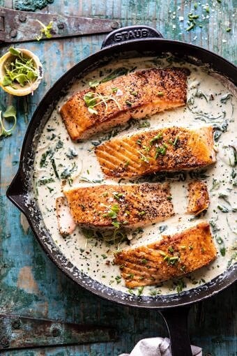 Garlic Butter Creamed Spinach Salmon | halfbakedharvest.com #salmon #easyrecipes #seafood #dinner