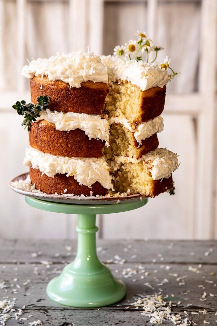 Lemon Coconut Naked Cake with Whipped Vanilla Buttercream | halfbakedharvest.com #coconutcake #springrecipes #easter #cake #layercake