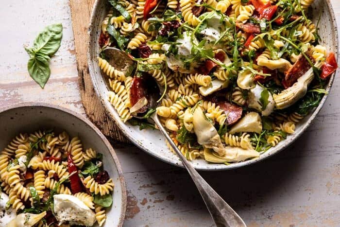 horizontal photo of Antipasto Pasta Salad with Herby Parmesan Vinaigrette