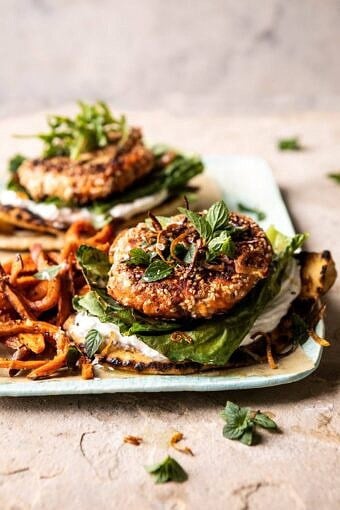 Sesame Crusted Curried Salmon Burgers with Lemony Herbs | halfbakedharvest.com #salmon #healthy #burger #summer