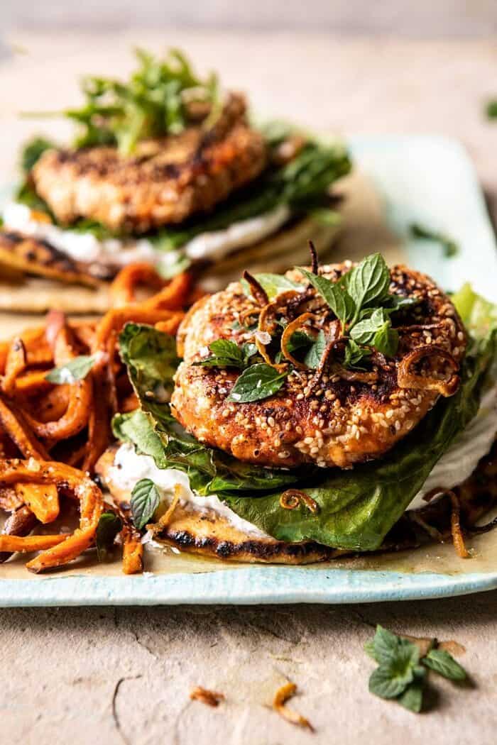 Sesame Crusted Curried Salmon Burgers with Lemony Herbs | halfbakedharvest.com #salmon #healthy #burger #summer