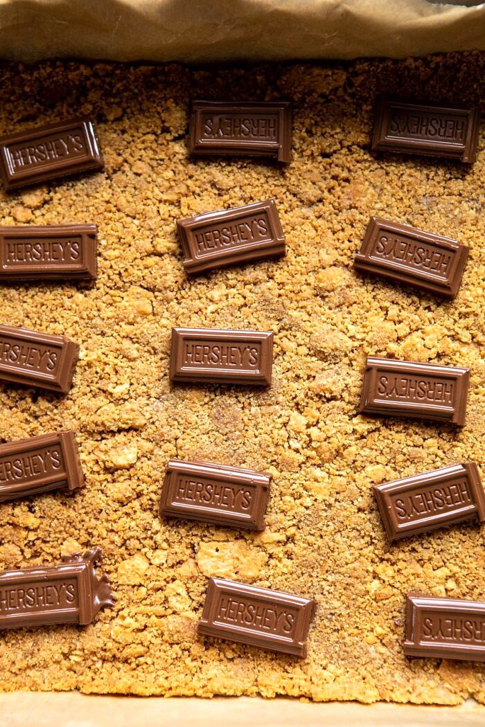 milk chocolate sitting on graham crackers before adding mousse