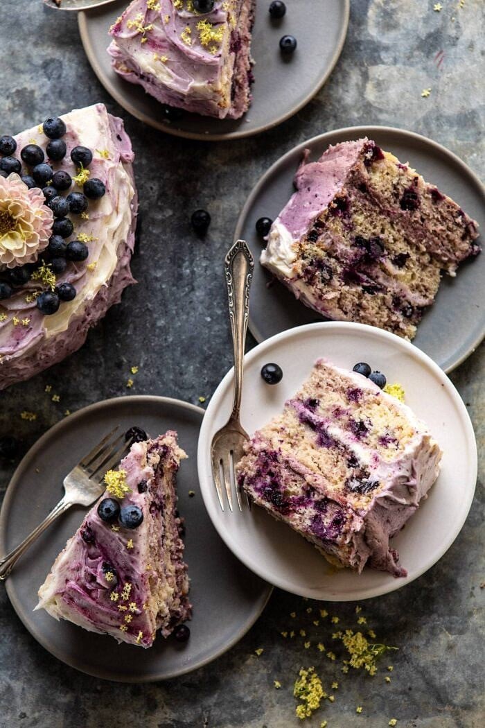 overhead close up photo of Bursting Blueberry Lemon Layer Cake slices 