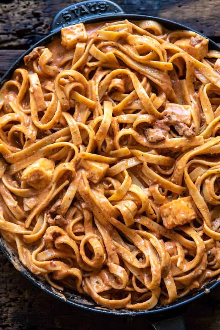 One Pot 30 Minute Creamy Tomato Basil Pasta Bake in skillet before baking