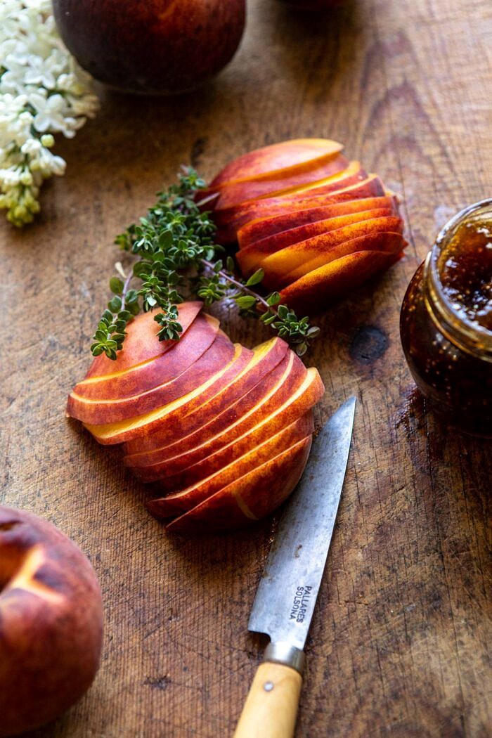raw peach slices on cutting board