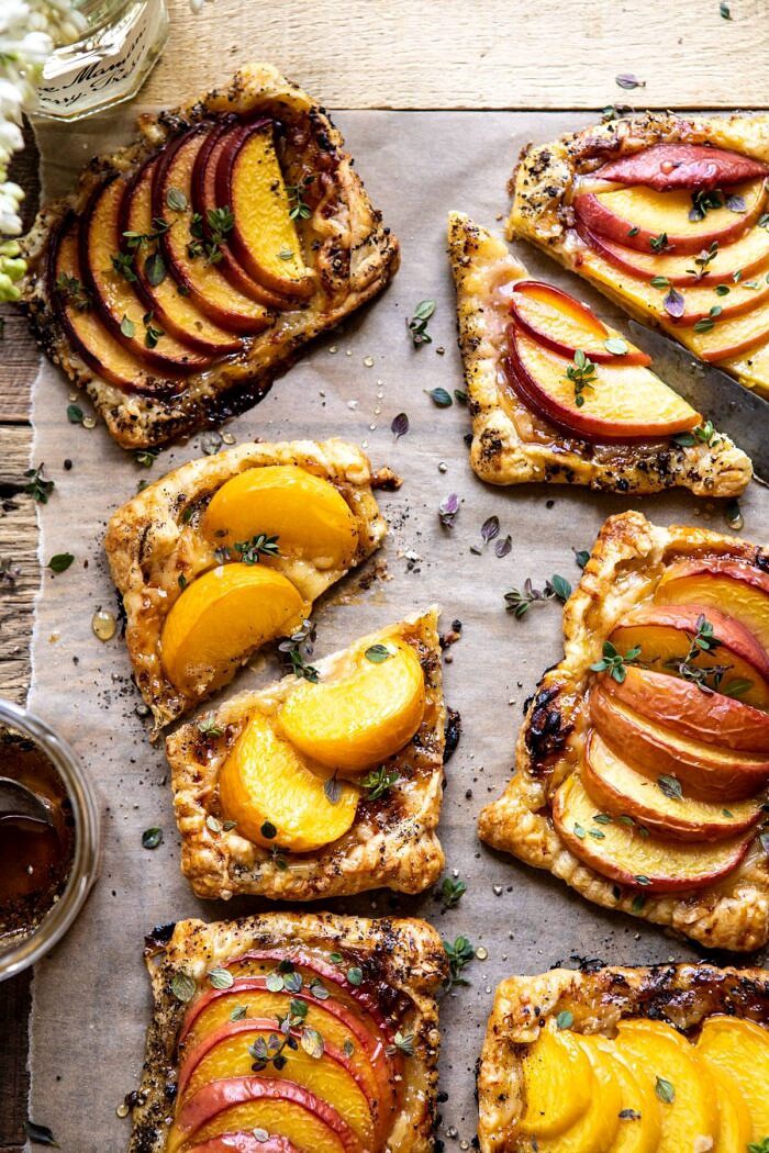 overhead close up photo of Peach Thyme Tarts with middle tart cut in half