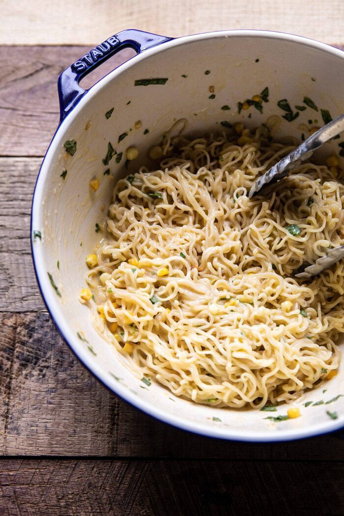20 Minute Ramen Carbonara in a bowl after being tossed together with eggs 