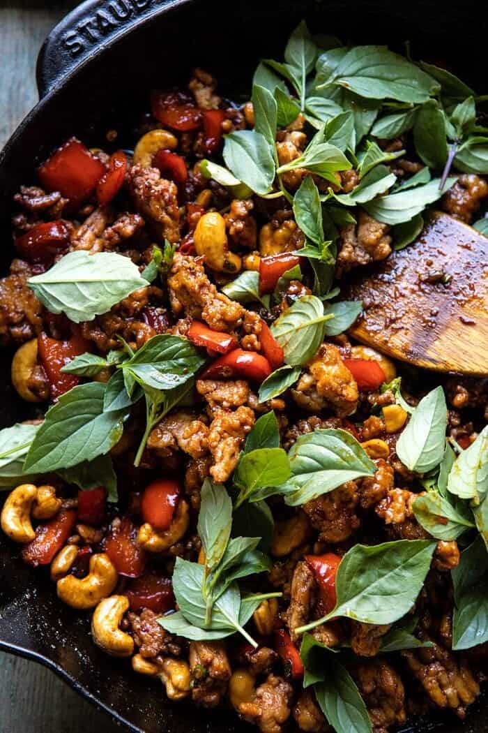 overhead photo of Better Than Takeout Sweet Thai Basil Chicken in skillet 