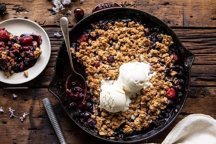 horizontal photo of Buttery Cherry Berry Skillet Crisp 