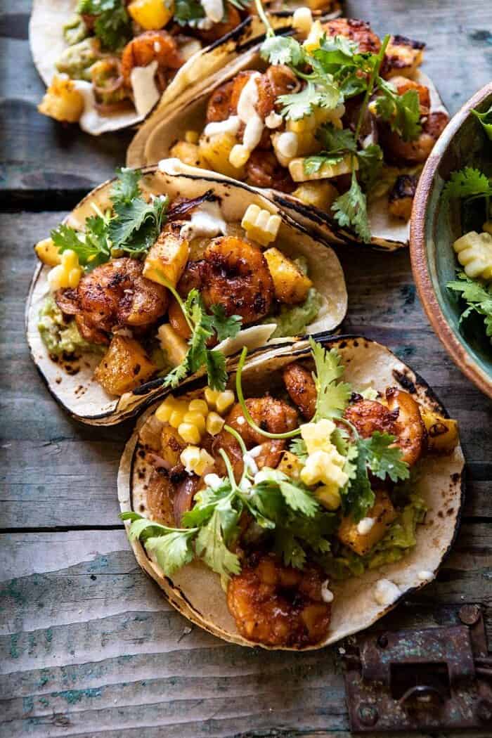 side angled close up photo of Sheet Pan Hawaiian Pineapple Shrimp Tacos 