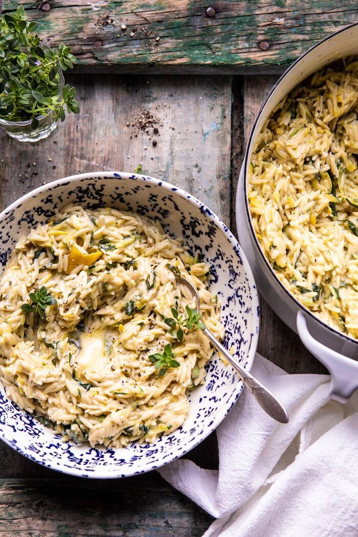 overhead photo of Souper Creamy Lemon Butter Cheesy Zucchini Orzo in serving bowl 
