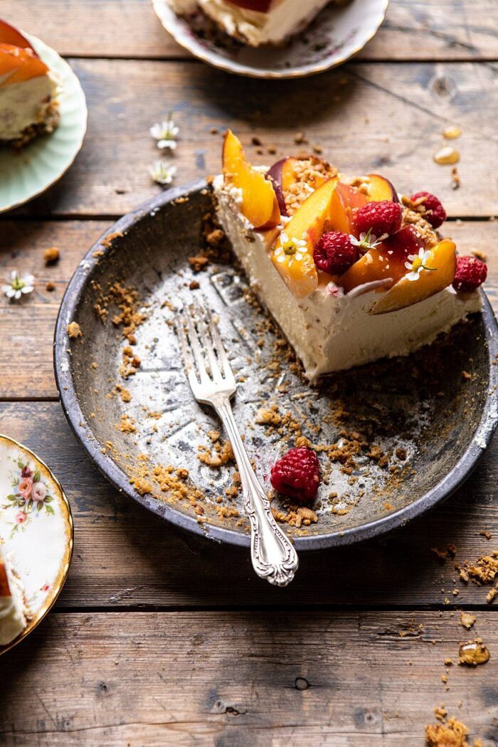 side angled photo of Peaches and Cream Pretzel Pie slice in pie pan