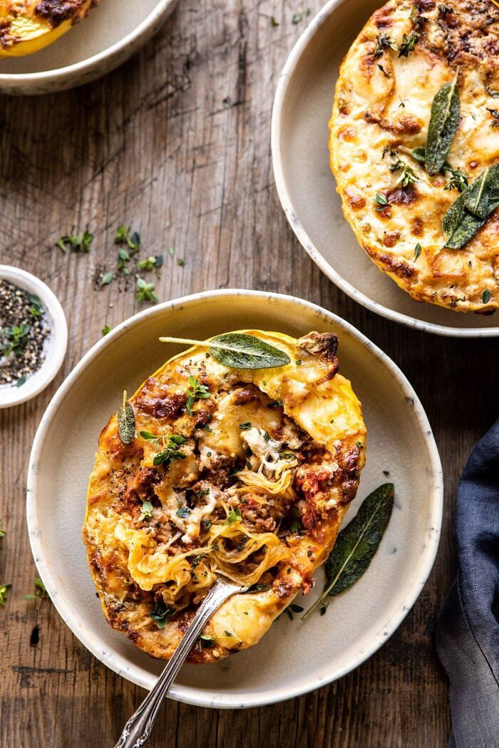 overhead photo of Roasted Garlic Spaghetti Squash Lasagna Boats with fork in spaghetti squash 