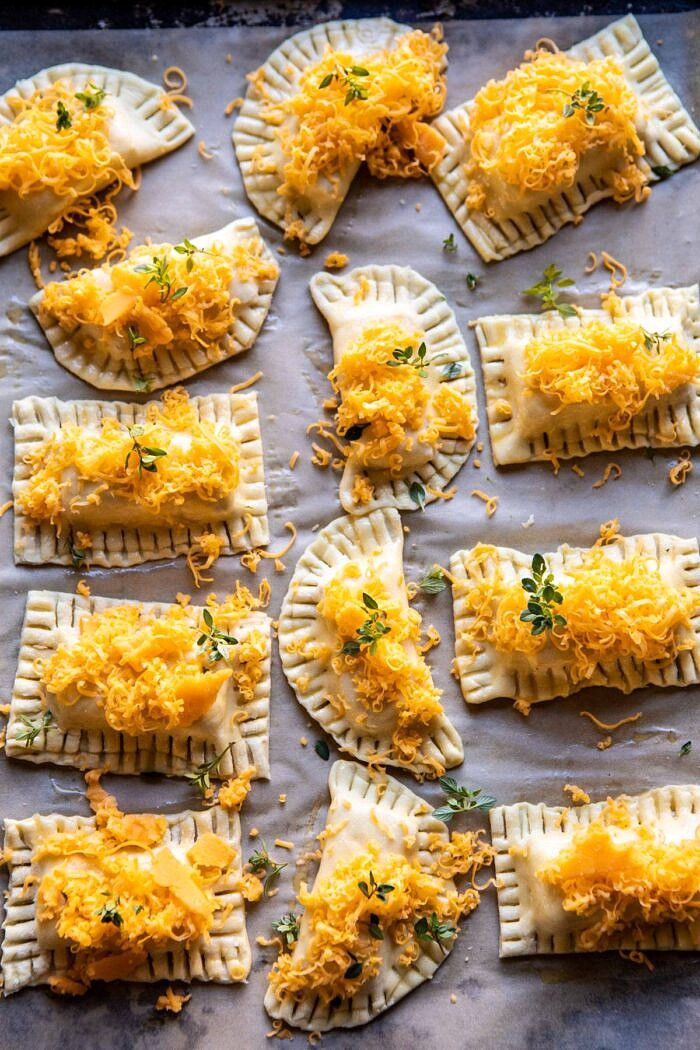 overhead photo of Creamy Broccoli and Butternut Squash Soup with Cheddar Brie Pastries on baking sheet before baking 