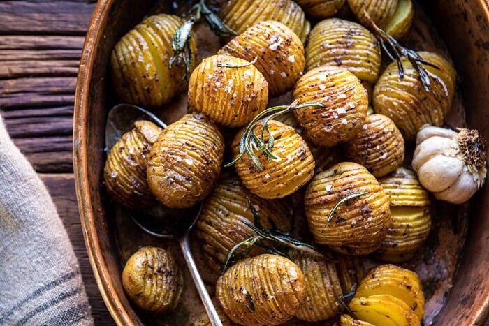 horizontal photo of Crispy Rosemary Butter Roasted Potatoes 