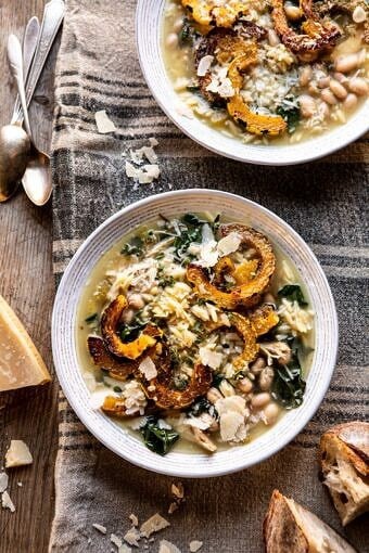 Crockpot Parmesan White Bean Chicken Soup with Roasted Delicata Squash | halfbakedharvest.com #crockpot #slowcooker #instantpot #chickensoup