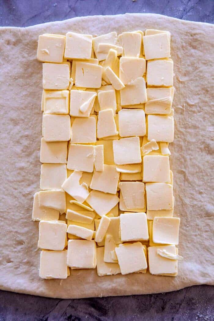 overhead close up of butter on dough 