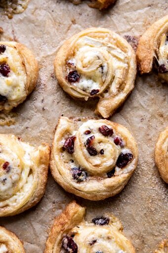 5 Ingredient Cranberry Brie Cinnamon Puff Pastry Swirls | halfbakedharvest.com #brie #cranberries #thanksgiving #christmas