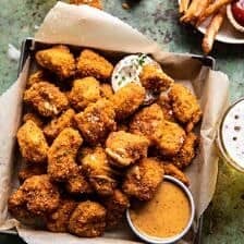 Oven Fried Cajun Popcorn Chicken with Creamy Honey Mustard | halfbakedharvest.com #chickenfingers #easyrecipes