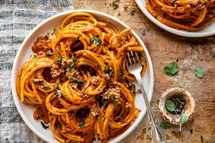 overhead horizontal photo of Roasted Red Pepper Alla Vodka Pasta with Cheesy Oregano Breadcrumbs 
