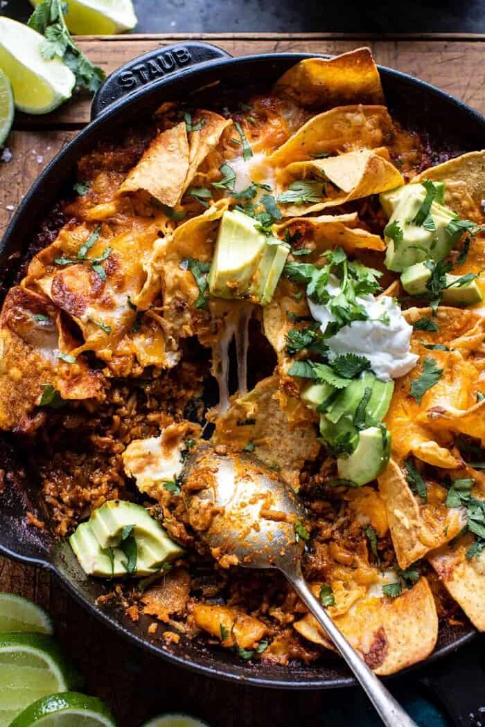 One Skillet Saucy Chicken Tortilla Enchilada Rice Bake | halfbakedharvest.com