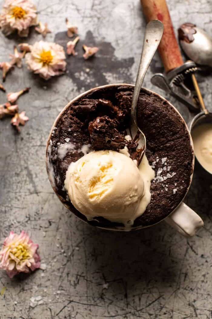 overhead close up photo of 5 Minute Molten Chocolate Mug Cake with ice cream 