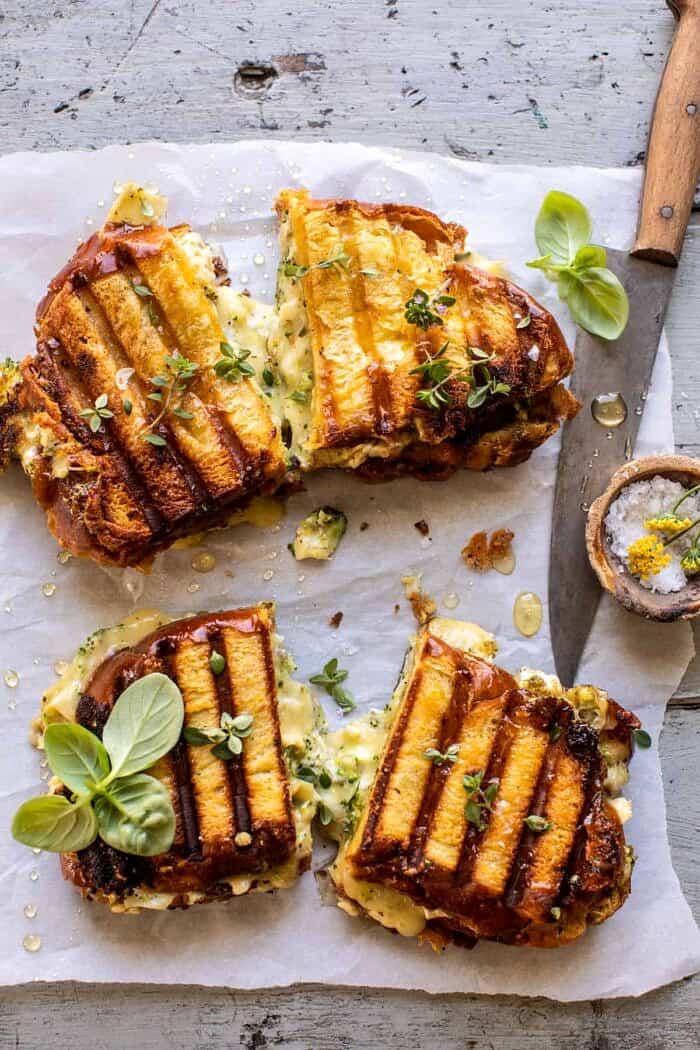 overhead photo of Artichoke and Broccoli Pesto Brie Panini with Thyme Honey