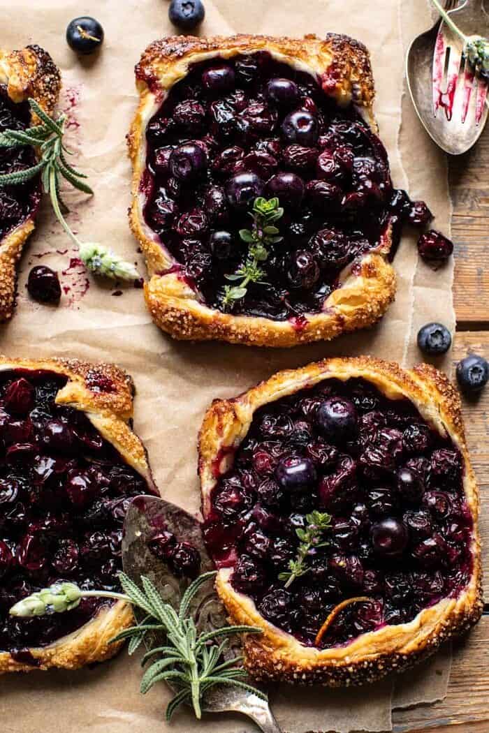 overhead photo of Bursting Blueberry Lemon Thyme Tarts 