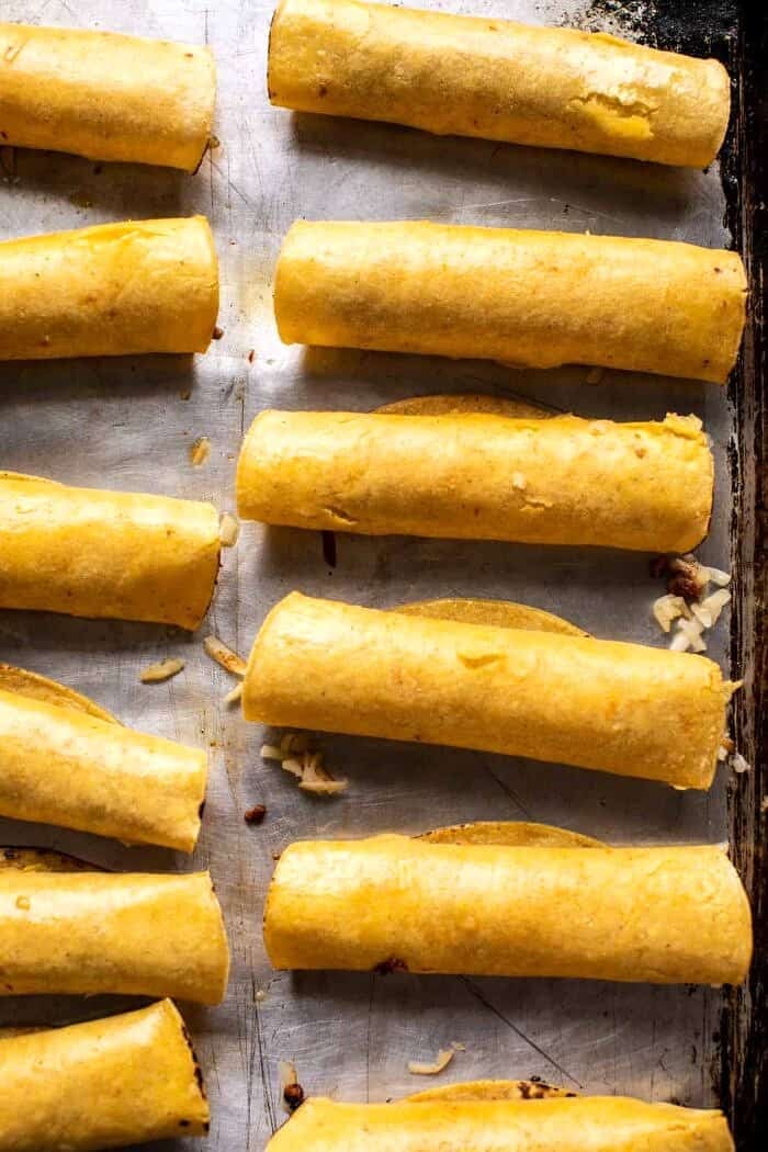overhead prep photo of Chicken Tinga Taquitos before baking 