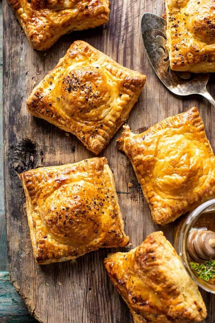 overhead photo of Prosciutto Caprese Puff Pastries with Peppery Thyme Honey