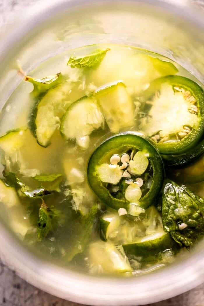 overhead prep photo of Spicy Cucumber Margarita being mixed in cocktail shaker