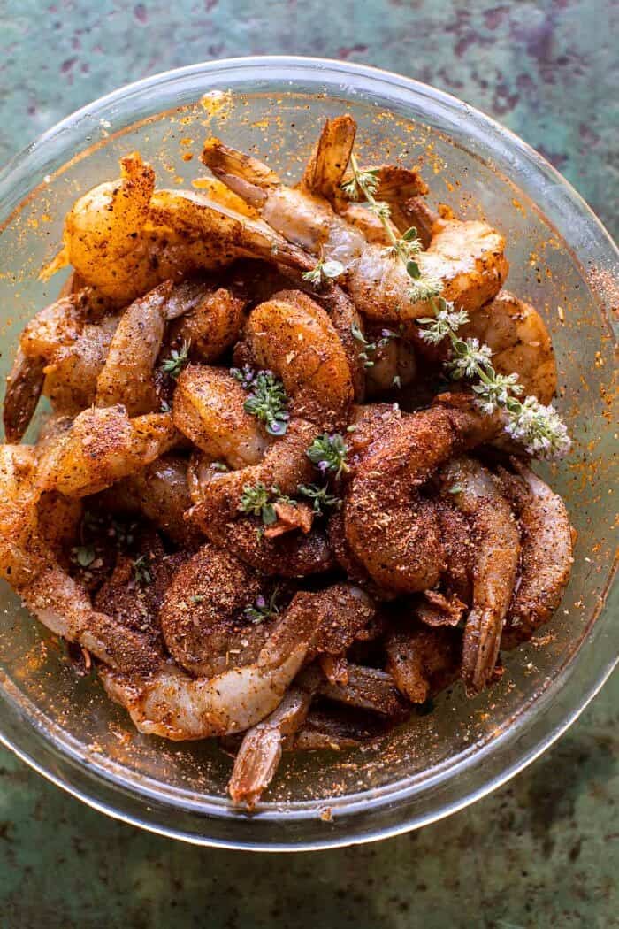 raw seasoned shrimp in bowl before cooking