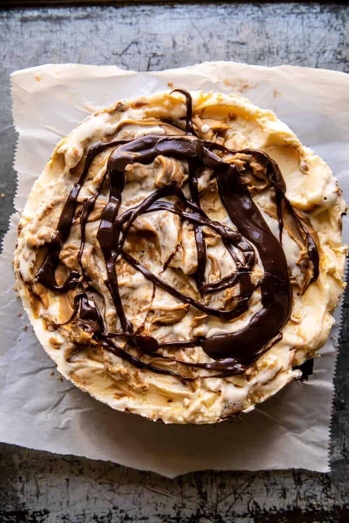 overhead prep photo of Fudgy Chocolate Peanut Butter Ice Cream Pretzel Cake before adding the final layer of chocolate and pretzels