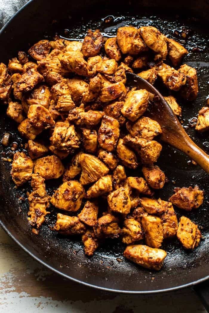 overhead prep photo of Greek Chicken in skillet after cooking