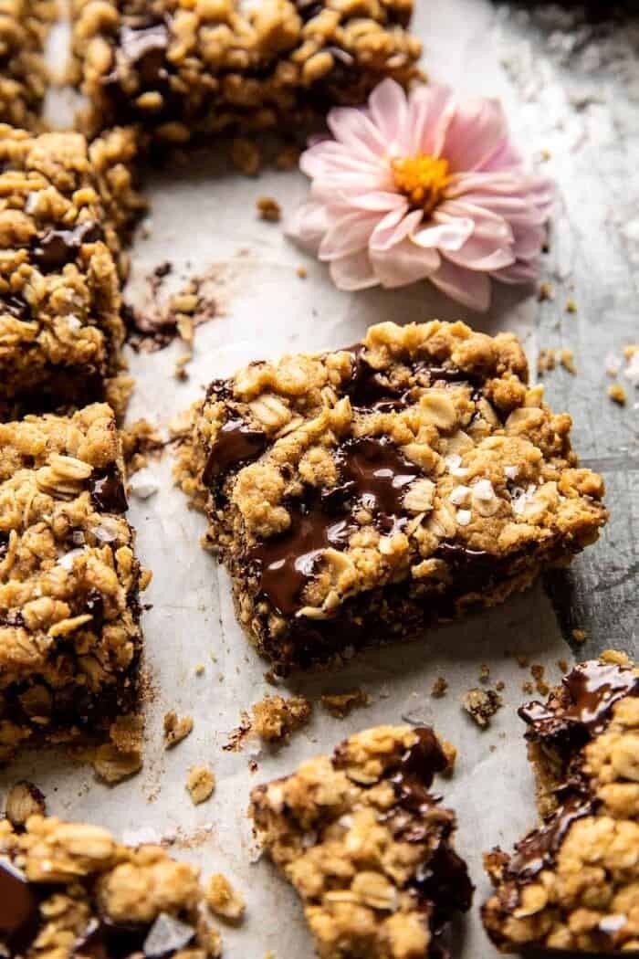 side angled close up photo of Healthier Dark Chocolate Chunk Oatmeal Cookie Bars