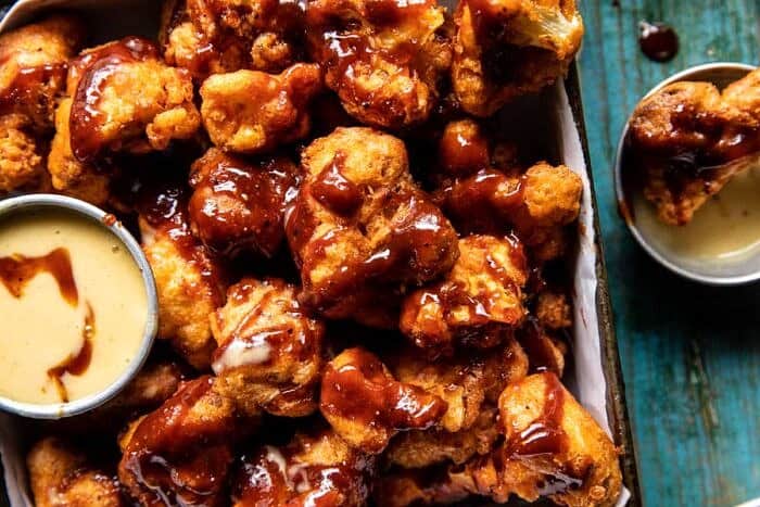 overhead photo of Crispy BBQ Beer Battered Cauliflower Nuggets | halfbakedharvest.com