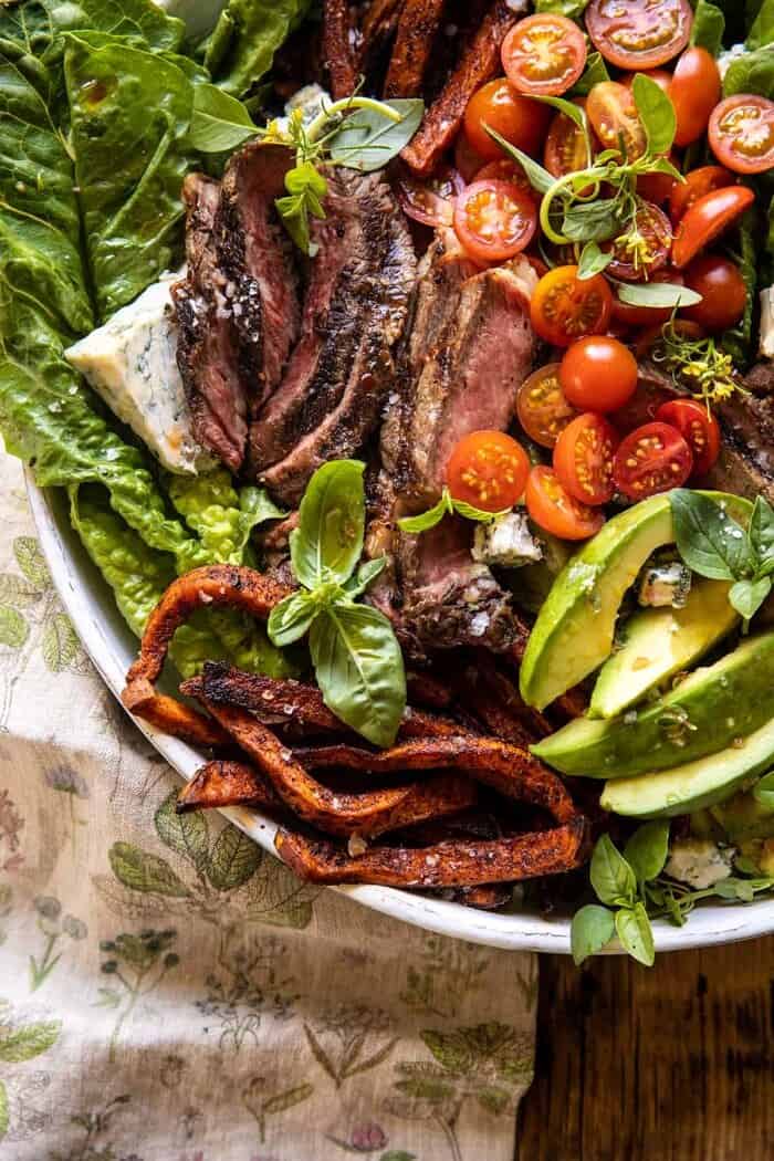overhead close up photo of Sweet Potato Fry Steak Salad with Blue Cheese Butter