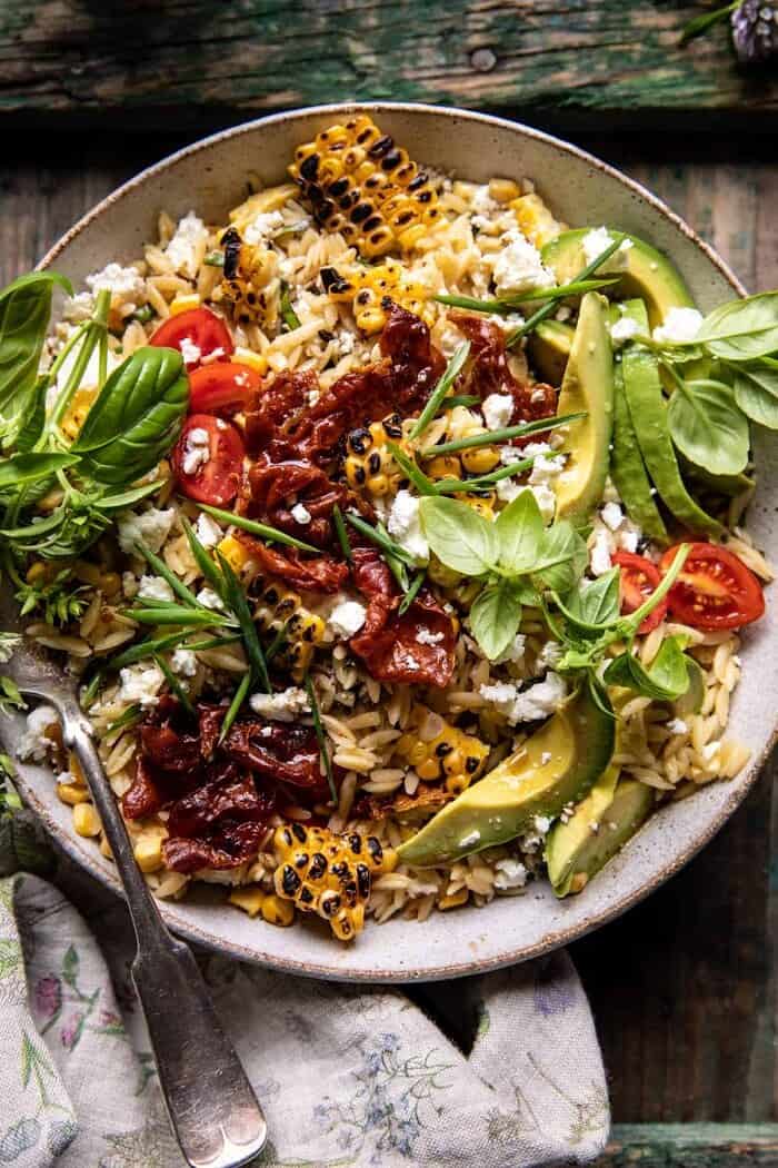 overhead photo of Brown Butter Corn and Feta Orzo with Crispy Prosciutto