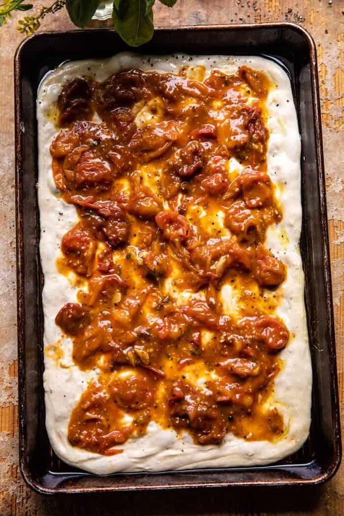 pizza on sheet pan before baking